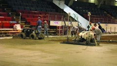 Heating and cooling lines under the concrete prevent large equipment from being on the floor, so Bravo Cement outfitted a Somero PowerRake and CopperHead screed with flotation tires to level and grade the concrete.