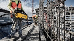 The vibrator can be activated remotely through DEWALT Wireless Tool Control and carried with an over-body hi-vis harness for transport.