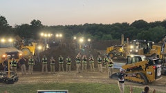 The triumphant drivers and tech team after the spectacular demo.