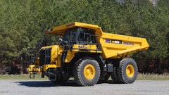 The HD605-10 mechanical haul truck is a 70-ton rigid frame machine designed for reliability and durability.